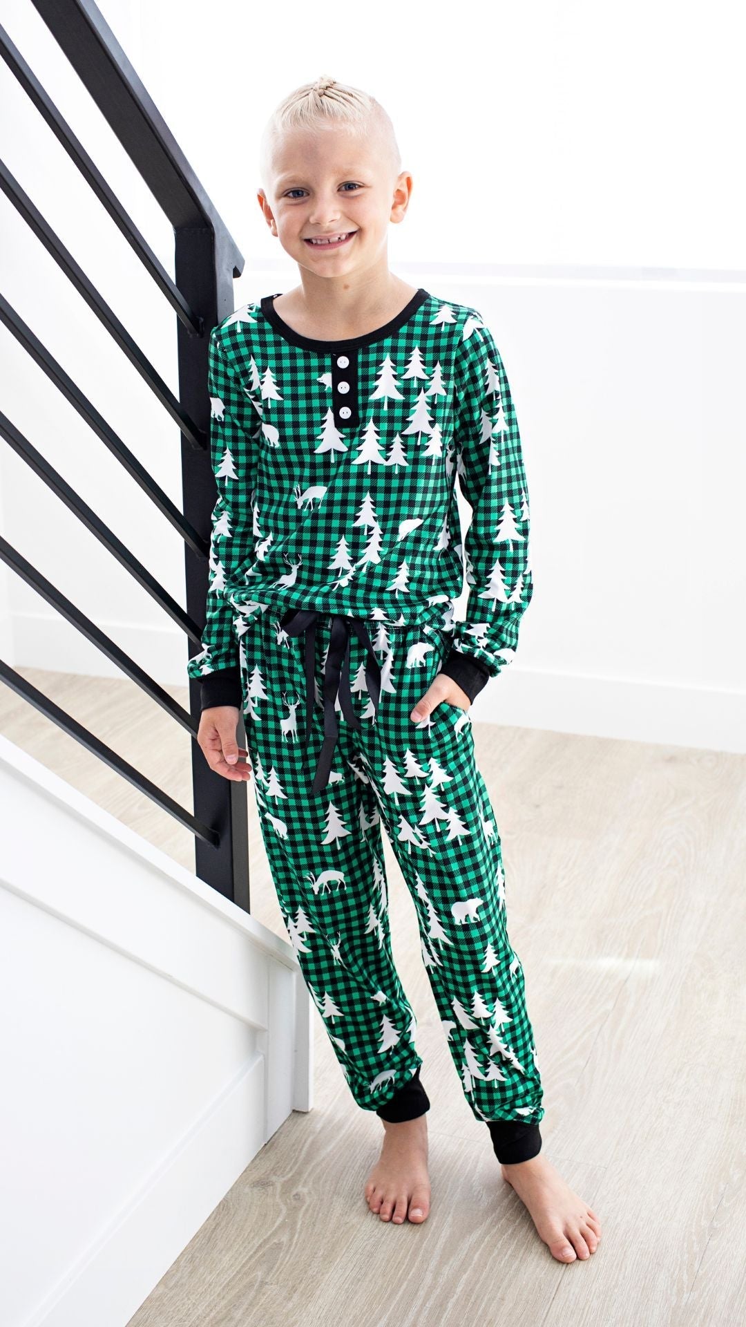Matching Family Christmas Pajamas in Winter Forest